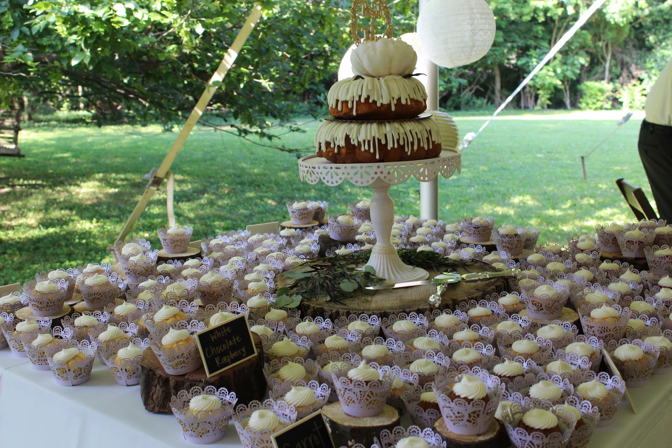 Table setting detail with fine linens and candlelight at Ridgeway