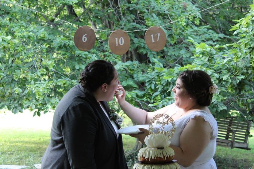 Guests enjoying a reception at Ridgeway beneath mature trees