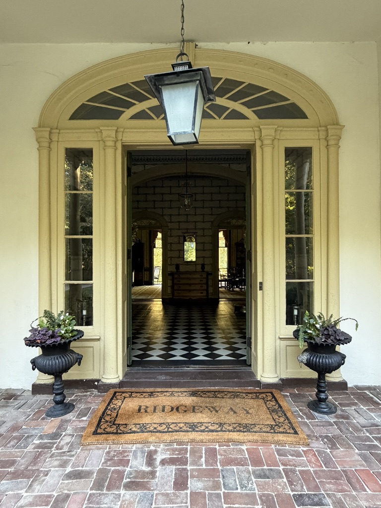 Ridgeway’s welcome mat and open front doors into the entry hall